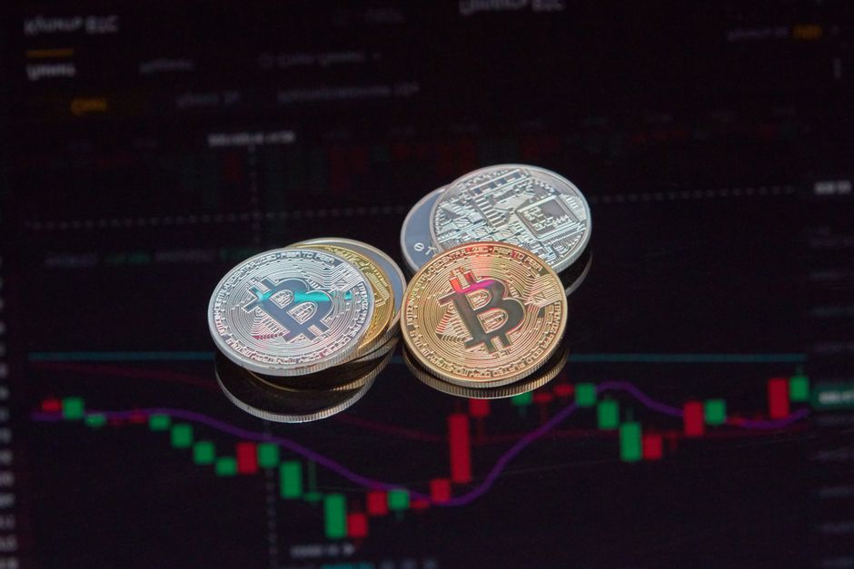 Digital token coins glowing in neon light