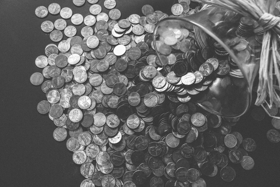 Gold coins representing cam performer earnings and tipping economy
