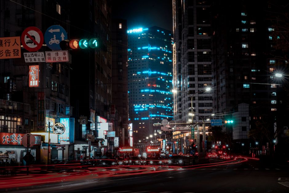 Neon-lit Taipei skyline at night