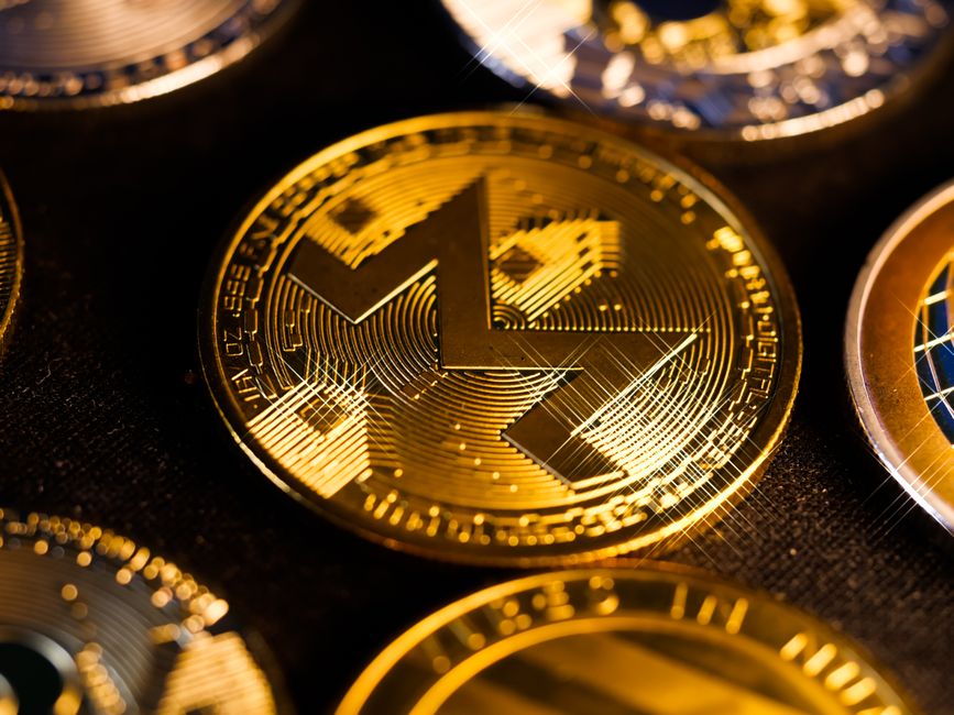 Gold coins representing cam platform token economy