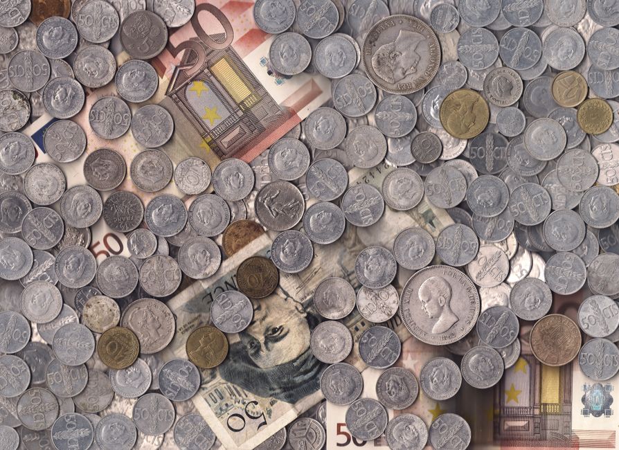 Gold token coins representing cam tipping economy