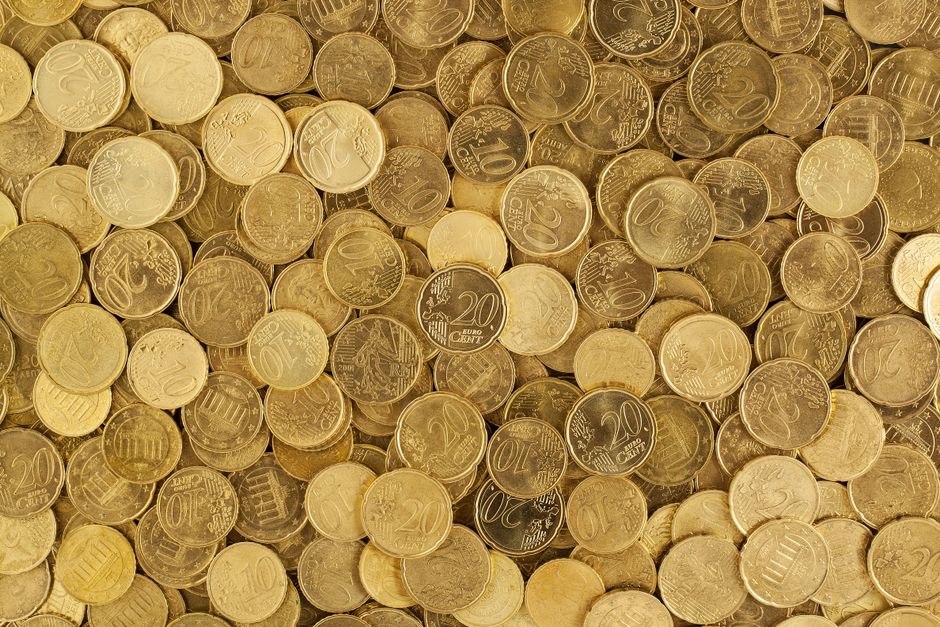 Gold coins representing cam girl earnings and token economy