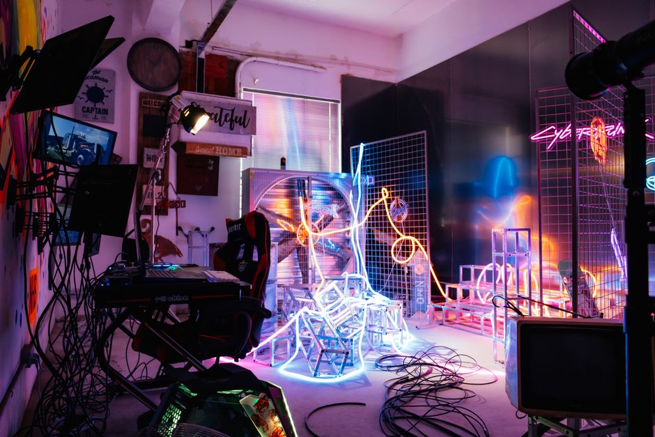 AI-powered cam studio with neon lighting