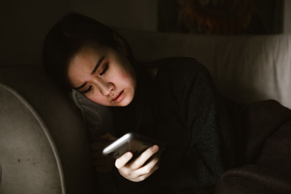 User browsing Stripchat spy mode on mobile