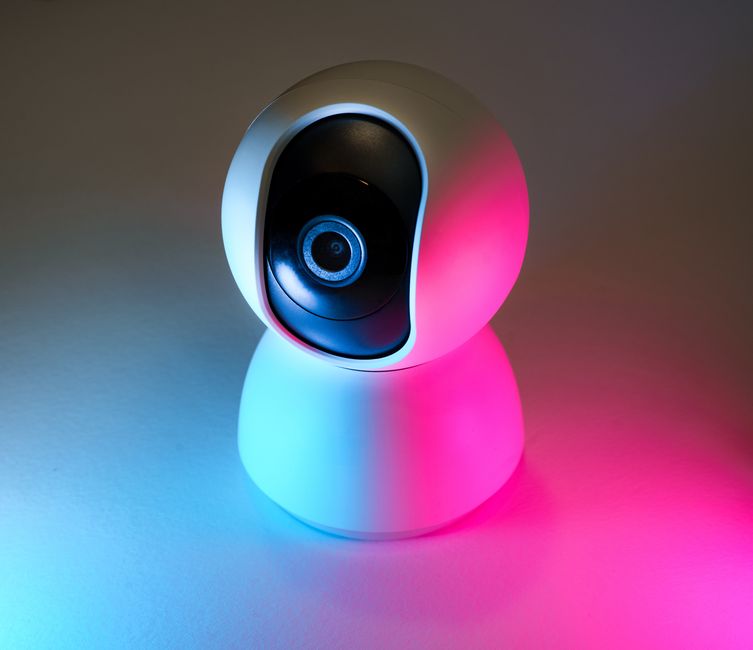 Trans cam performer streaming setup with neon lighting