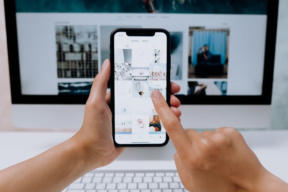 User browsing adult GIFs on smartphone